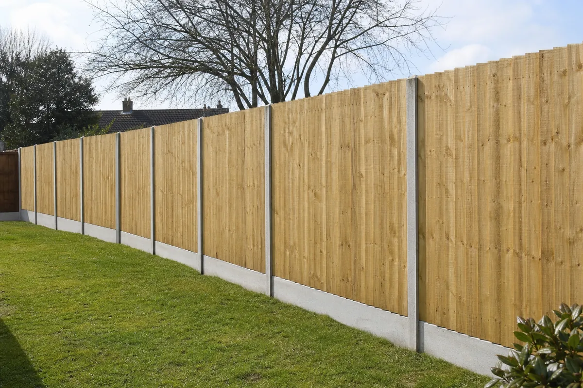 Feather edge fencing with concrete posts in North Hykeham